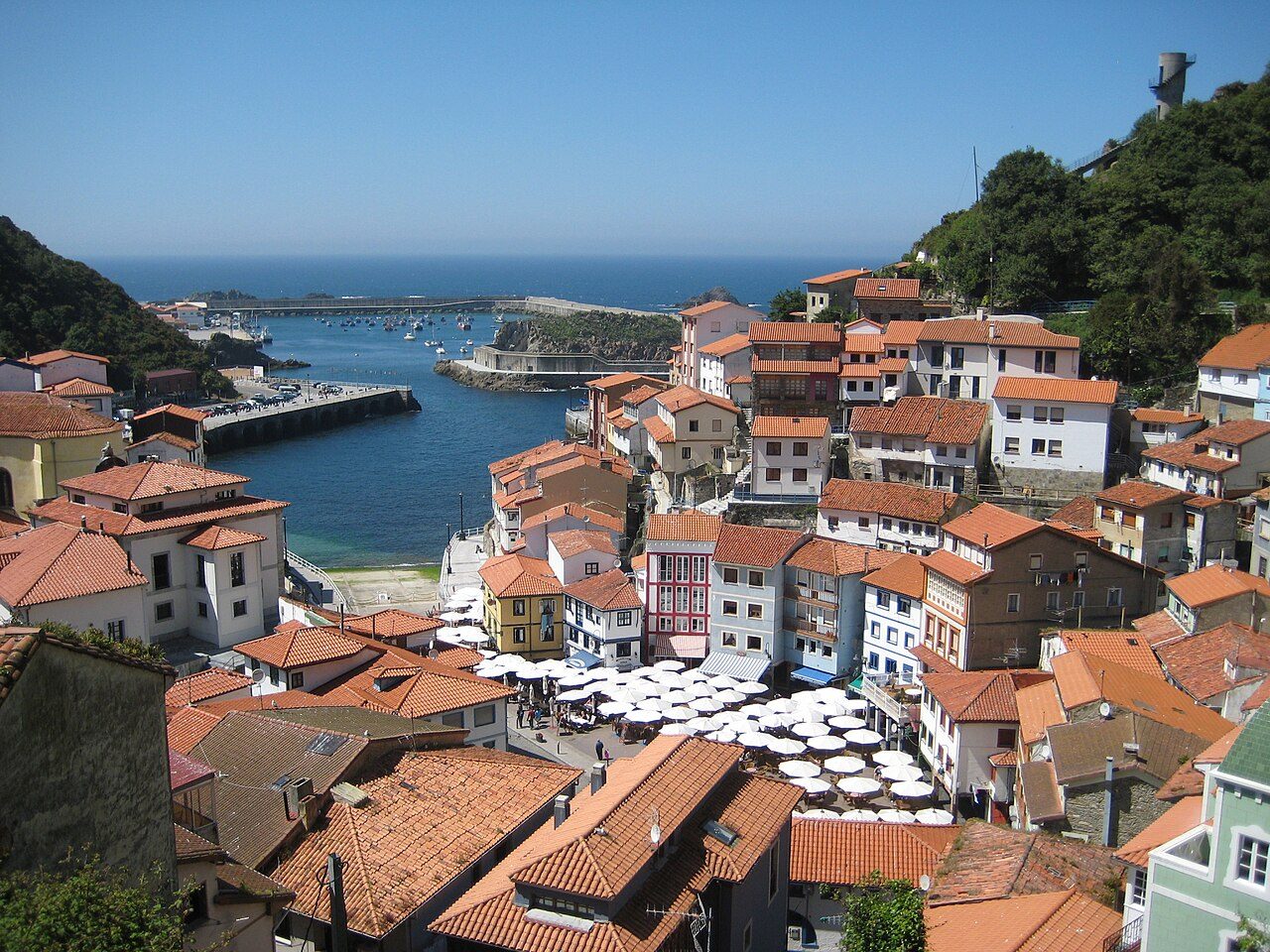 Colourful houses stacked around the harbour of Cudillero, Asturias